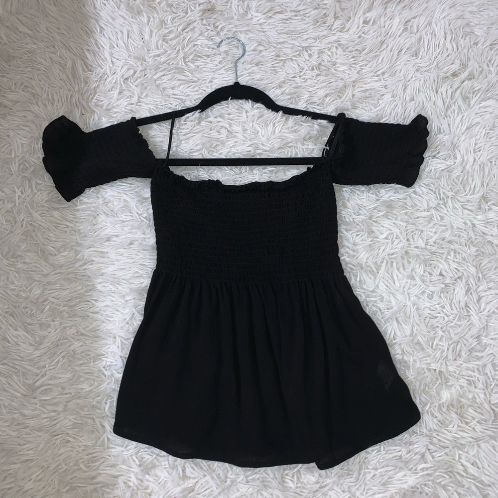 Off sleeve black top